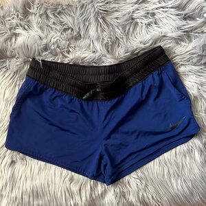 Ladies Nike Dri-fit blue / black shorts with pockets sz M